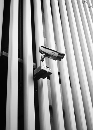 secuirty camera on a fence